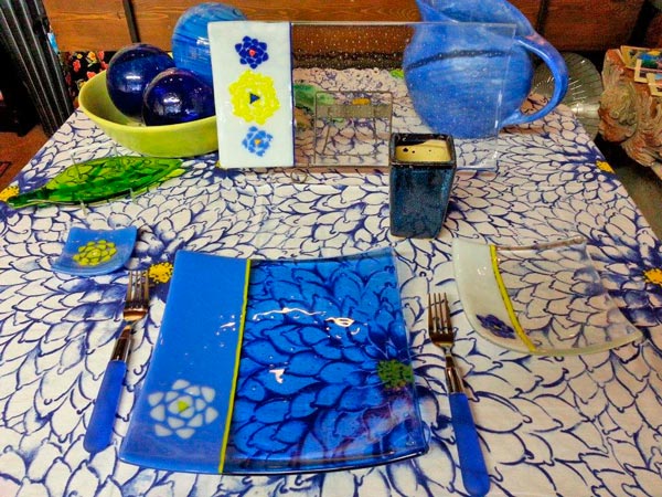 blue glass plate and tablecloth