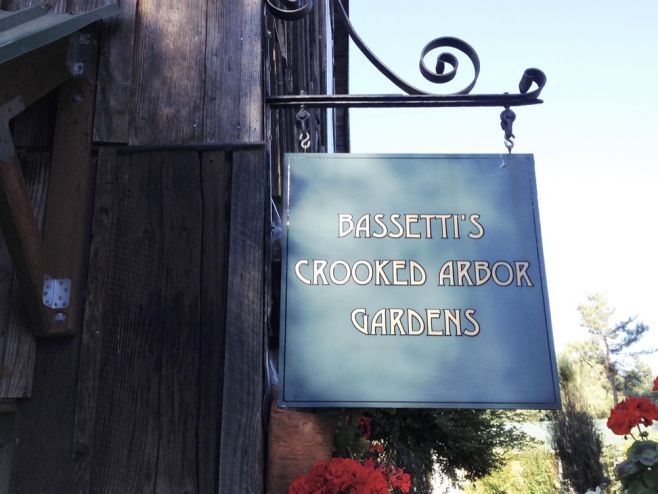 Bassettis' Crooked Arbor Gardens sign on barn